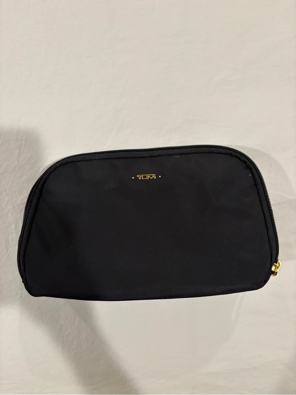 Tumi Black Cosmetic Pouch with Gold Accent